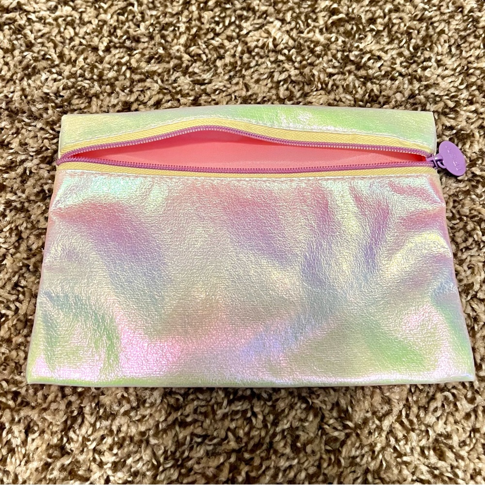 Iridescent pink and white Ipsy makeup bag